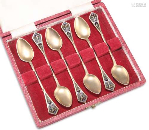 A SET OF SIX NORWEGIAN SILVER-GILT AND PLIQUE-À-JOUR SPOONS,...