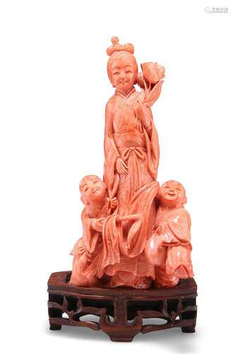 A 19TH CENTURY CHINESE FINE CORAL FIGURE GROUP, carved as a ...