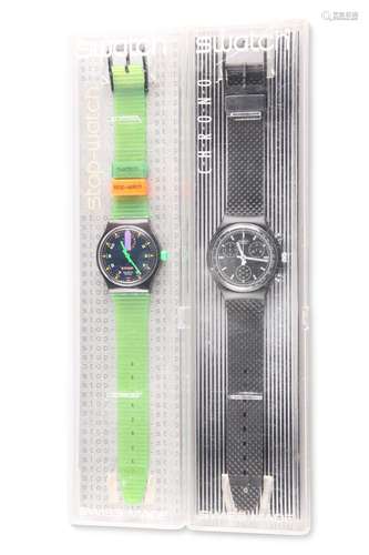 TWO SWATCH WATCHES, comprising BLACK FRIDAY SCB100 and STOP ...