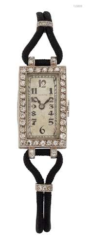 A ZENITH DIAMOND COCKTAIL WATCH, the rectangular silvered di...