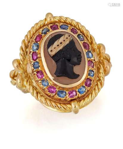 A SARDONYX HABILLÉS CAMEO, RUBY AND SAPPHIRE RING, an oval s...