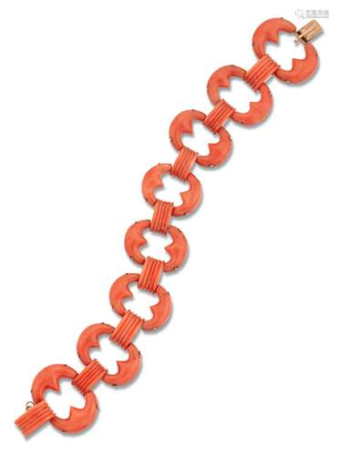 A CORAL BRACELET, fancy oval hoop links spaced by reeded bar...