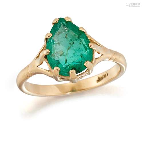 AN EMERALD RING, a pear-cut emerald in claw setting, to fork...