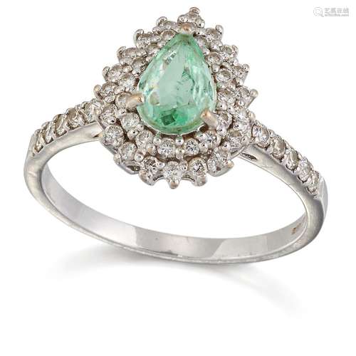 AN 18 CARAT GOLD GREEN BERYL AND DIAMOND CLUSTER RING, a pea...