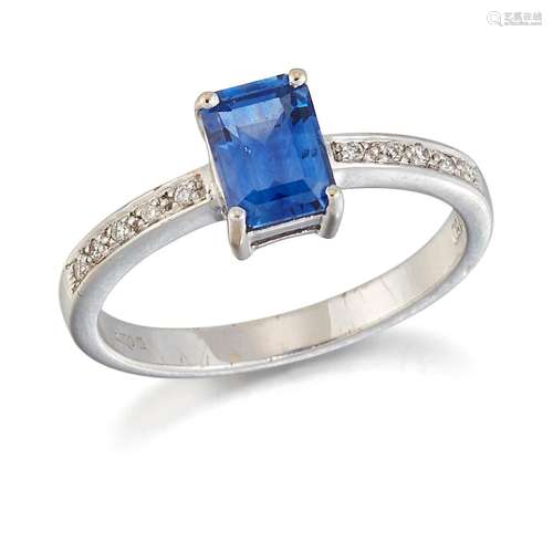 AN 18 CARAT WHITE GOLD SAPPHIRE AND DIAMOND RING, an octagon...