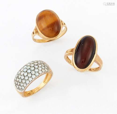 THREE 9 CARAT GOLD GEM-SET RINGS, including A TIGER'S E...