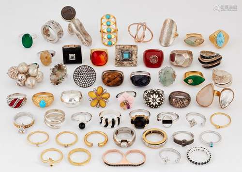 IN EXCESS OF FIFTY SILVER AND GEM-SET RINGS, including THREE...