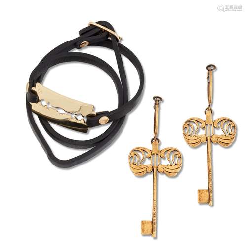 ALEXANDER MCQUEEN - A RAZOR TRIPLE WRAP GILT BRASS AND BLACK...