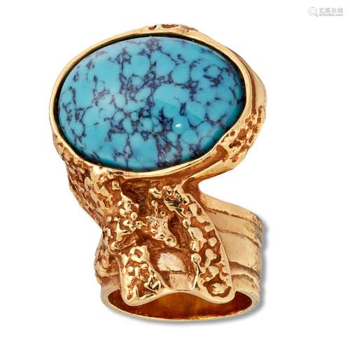 YVES SAINT LAURENT - A GILT-METAL AND PASTE ARTY RING, set w...