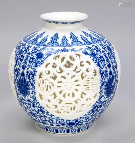 Spherical vase with breakthrou