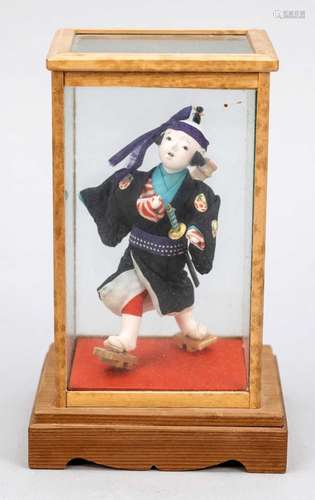 Doll of a boy in samurai costu