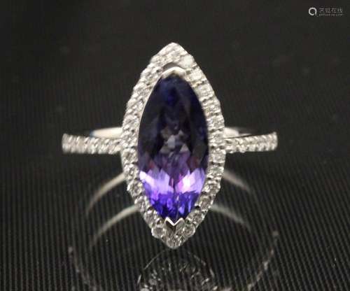 18K DIAMOND AND 2.42 CT. TANZANITE RING