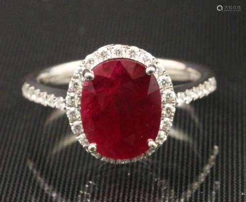 18K RUBY AND DIAMOND RING; RUBY CENTER 3.28 CTS.