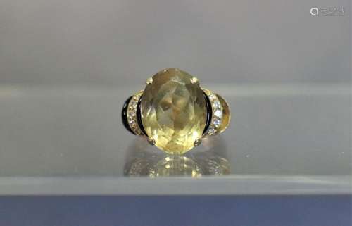 Bague or jaune 750/°° avec au centre une citrine ovale 16x12...