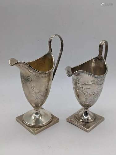A George III silver cream jug, etched decor, vacant