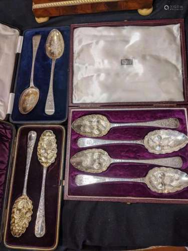 A cased set of four Georgian silver berry spoons,