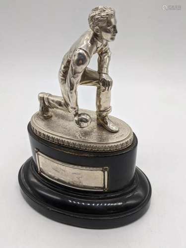 A silver bowling figure, mounted on wooded base, vacant