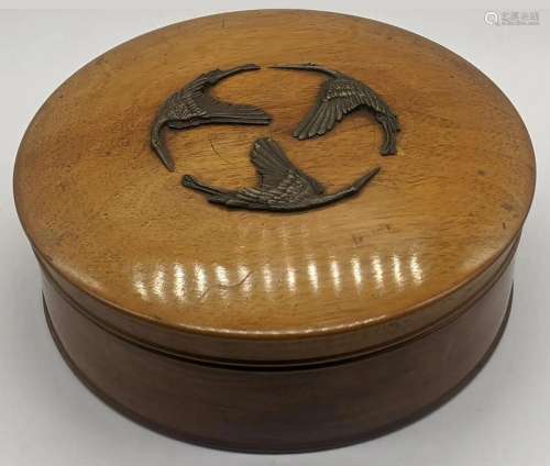 A Japanese Meiji period circular box mounted with 3