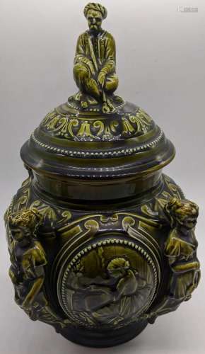 An 18th century French green ceramic tobacco pot and
