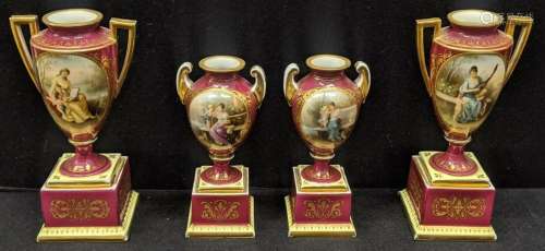 A pair of Royal Vienna porcelain urns, together with