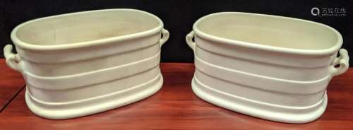 A pair of twin handled ceramic troughs, H.21cm L.51cm