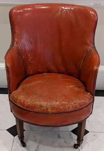 A 19th century leather library chair