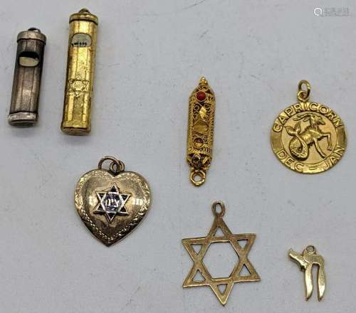 A collection of Jewish pendants, some gold