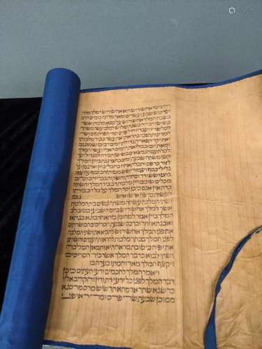 A Sephardi Megillah scroll with a blue backing