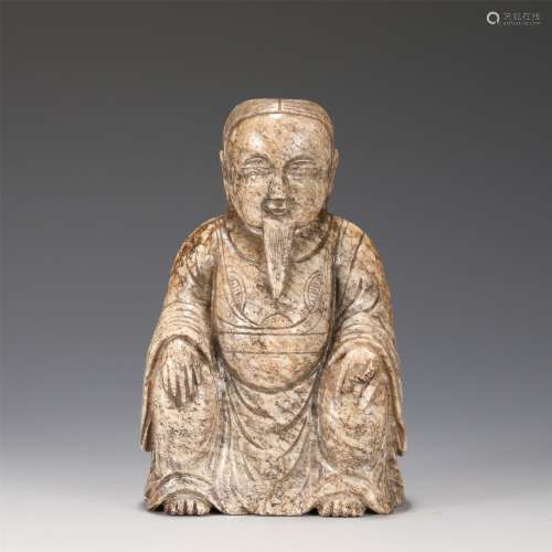 A Carved Stone Taoism Figure