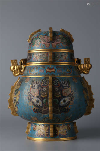 A Gilt Copper Cloisonne Pot with Handle.