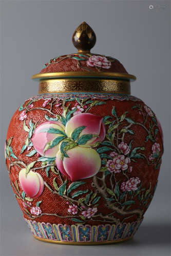 A Rose Porcelain Lidded Jar with Golden Rim.