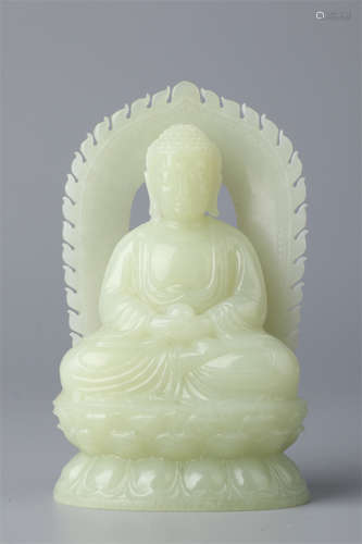 A Hetian Jade Sakyamuni Buddha Statue.