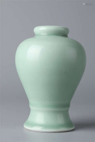 A Bean Green Glazed Porcelain Bottle.