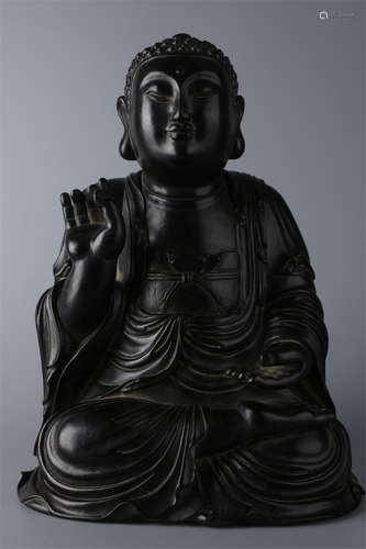 A Narra Wood Sakyamuni Buddha Statue.