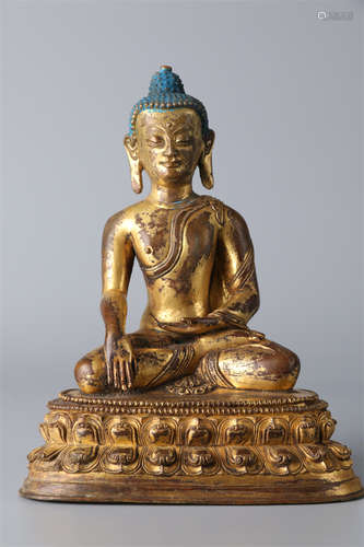 A Gilt Copper Sakyamuni Buddha Statue.