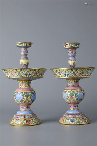 A Set of Enameled Porcelain Candlesticks.