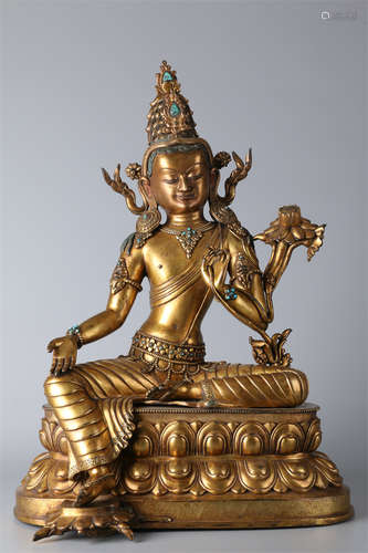 A Gilt Copper Brahman Buddha Statue.