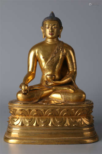 A Gilt Copper Bhaisajyaguru Buddha Statue.