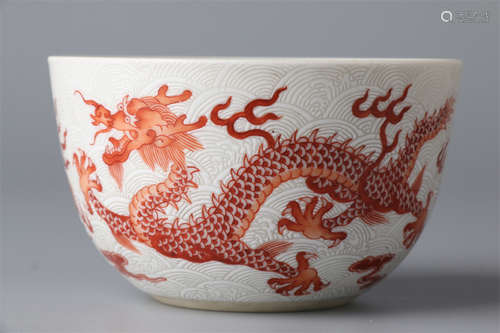 A Porcelain Cup with Iron-Red Dragon Design.