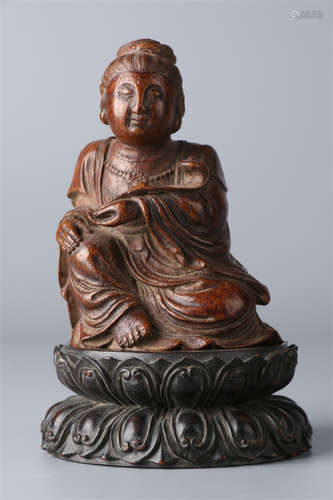 A Bamboo Sitting Avalokitesvara Statue.