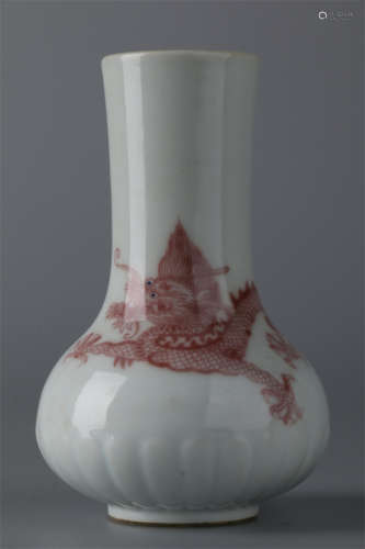 A Porcelain Bottle with Dragon Design.