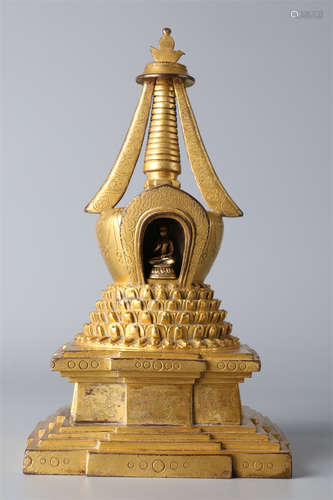 A Gilt Copper Buddhist Stupa.