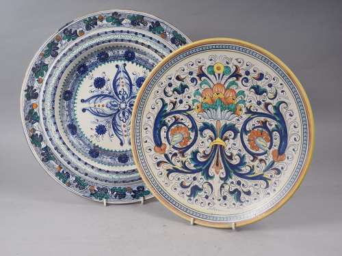 A Mariucci Deruta polychrome enamel charger with traditional...