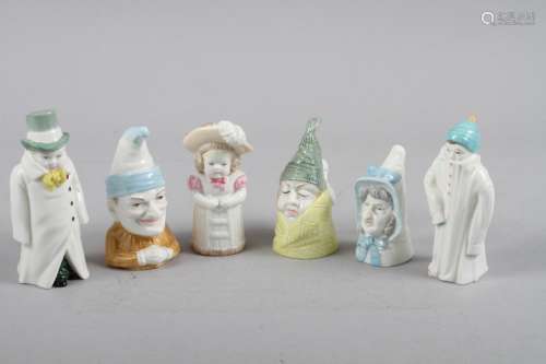 Six Royal Worcester candle snuffers, formed as figures and f...