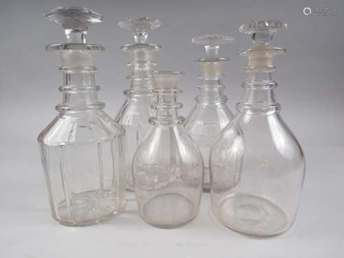 Four 19th century three ring neck decanters and stoppers, an...
