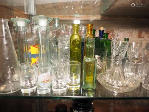 An assortment of glassware, including a pair of candlesticks...