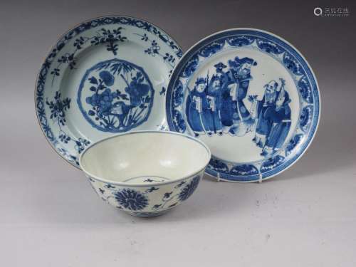 A Chinese blue and white bowl with lotus flower and scrolled...