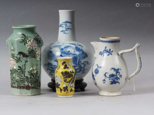 A Chinese blue and white bulbous vase, decorated figures on ...