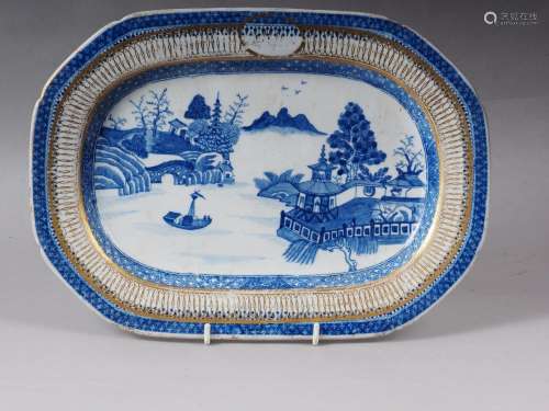 A 19th century Chinese blue and white platter, decorated lan...