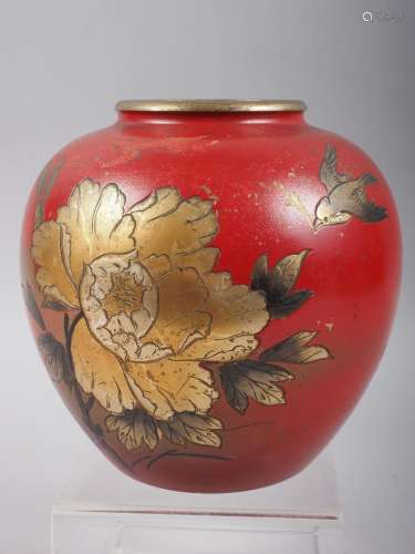 A red lacquered brass ginger jar with gilt flower and bird d...